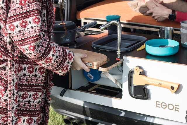 Folding board hides a knife in it